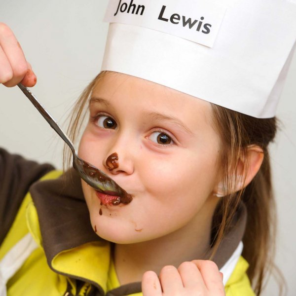 brownies_043  © Licensed to simonjacobs.com. 30/01/2014 Watford, UK. The 12th Watford St Luke's Brownies make cup cakes and fruit salad to complete their 'Cook's Badge' as part of the John Lewis 'Bringing Skills to Life' scheme.Photo credit : Simon Jacobs